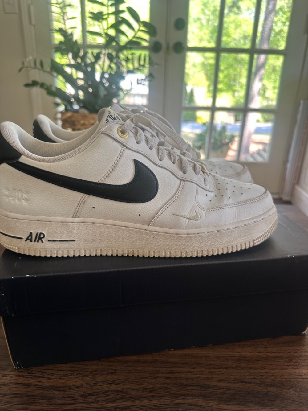 Nike Men’s Low-Top White Sneakers with Black Swoosh